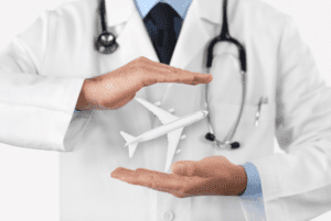 doctor holding airplane starmed